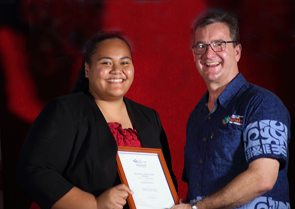 Ms. Ebony-Jean Ta'avili representing SkyEye receiving the award from Mr. Kinne